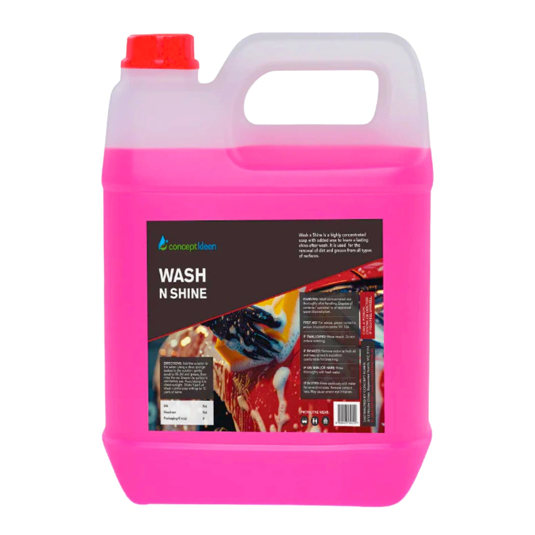 A large plastic jerrycan of Concept Clean Wash N Shine car wash cleaner, filled with bright pink liquid, featuring a red cap and a black label with product imagery.