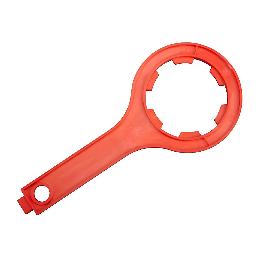 A bright red plastic tool with a circular ring head and a flat handle featuring a hanging hole, shown on a plain white background.