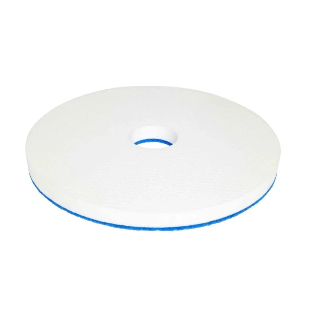 A round white foam pad with a central hole and a blue rim, shown on a plain white background.