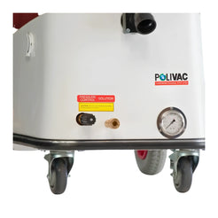 Close-up of the side of a white POLIVAC industrial machine with caster wheels, a pressure gauge, a small yellow warning label, and a black outlet pipe on a white background.