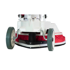 A close-up rear view of a commercial floor scrubber machine, showing its white plastic housing, red fabric dust bags, black rubber tires with gray sidewalls, and a black spring mechanism, isolated on a white background.