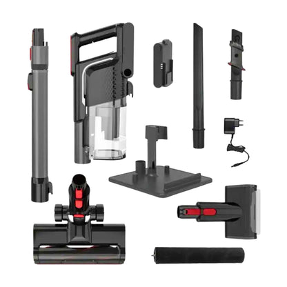 A cordless stick vacuum cleaner kit with multiple accessories and a charging adapter, arranged on a plain white background. The vacuum and included parts are primarily black and dark gray with small red accents.