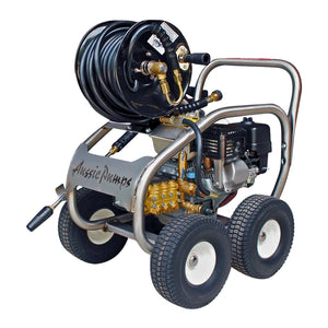 A high-pressure water washer with a black coiled hose, a black engine, and a silver metal frame with four wheels. The brand name 'Aussie Dumas' is printed on the side panel.