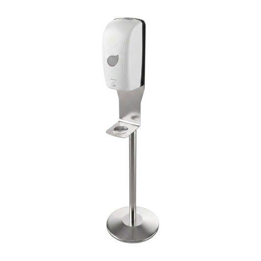 A modern wall-mounted automatic hand sanitizer dispenser with a white plastic top section and a brushed stainless steel stand with a circular base, shown against a plain white background.