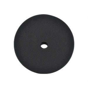 A round black foam disc with a central hole, shown against a plain white background.