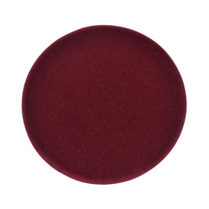 A circular fabric swatch in a deep burgundy red color, shown against a plain white background.