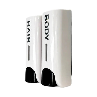 Two white wall-mounted dispenser units labeled HAIR and BODY, shown on a plain white background.