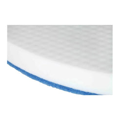 A close-up of a white textured foam or rubber pad with a blue edge layer visible along the curved bottom edge, shown on a plain white background.