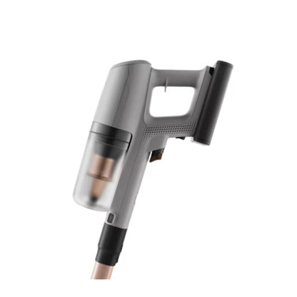 A cordless stick vacuum cleaner with a gray and black body, featuring a transparent dust bin showing a copper-colored filter, set against a plain white background.