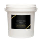 A white plastic bucket of Lavatory Ball Violet Urinal Tablets, featuring a black label with gold accents and white text.