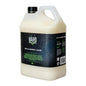 A 5L plastic jug of Vard No. 8 Laundry Liquid, filled with an off-white liquid and featuring a black cap and a dark label with green and white text.