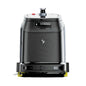 A black robotic delivery bot with a carbon-fiber textured front panel, a central silver logo, and a yellow accent strip along the bottom edge, shown against a plain white background.