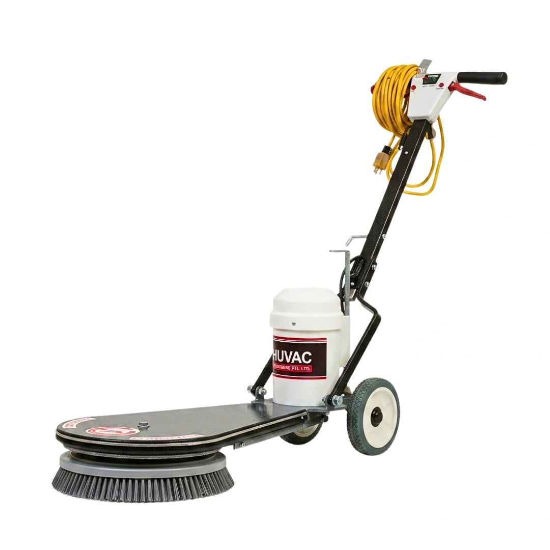 A UTVAC industrial floor scrubber machine with a black metal frame, gray rotating brush head, white plastic container, yellow coiled hose, and black handle on a white background.