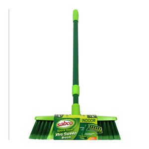 Sabco Xtra Sweep Indoor broom with a green and lime green plastic handle and bristles, featuring a paper band label around the base.