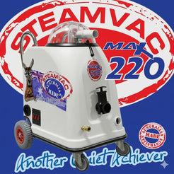 White Steamvac Max 220 steam cleaner with wheels, featuring 'Australia Made' stickers and a large red and white Steamvac logo in the background.