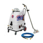 A white commercial carpet cleaner machine on wheels with a long metal handle, blue air hose, and floor nozzle, shown on a plain white background. The machine has decorative Team USA graphics and a deer illustration on the front.
