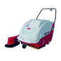 A Brava ITT commercial floor care machine, specifically a vacuum/dry sweeping unit, shown from a three-quarters angle on a white background. The machine features a white upper body with a red lower chassis, a black handle, and a red dust cup with a black bristle shield.