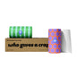 A kraft paper box labeled 'who gives a craft' with two rolls of bamboo paper towels behind and beside it, one roll in green and white pattern and one in purple and orange pattern, with a white towel sheet pulled out on a white background.