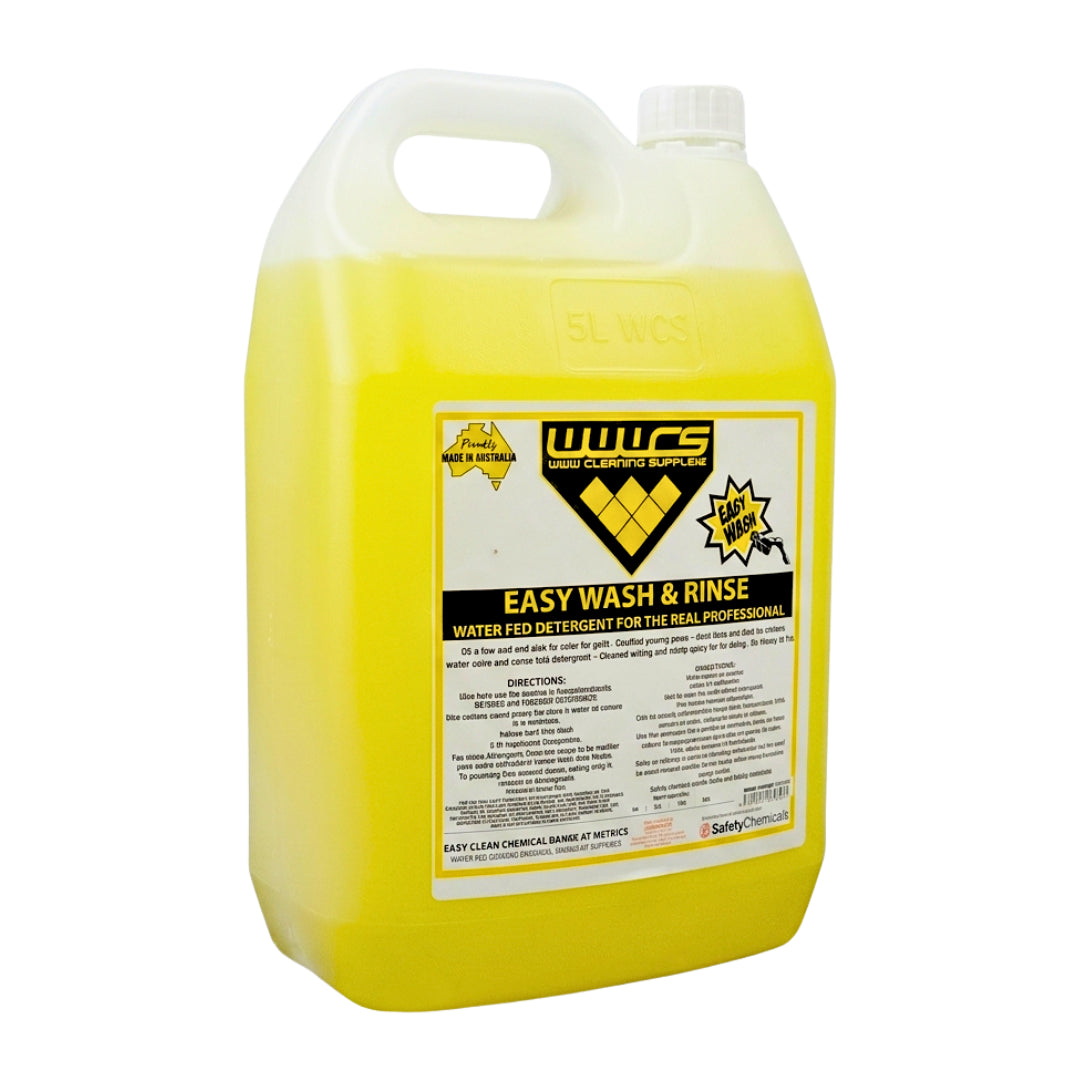 A large plastic jug of WWCS Easy Wash & Rinse water fid detergent, filled with bright yellow liquid, on a plain white background.