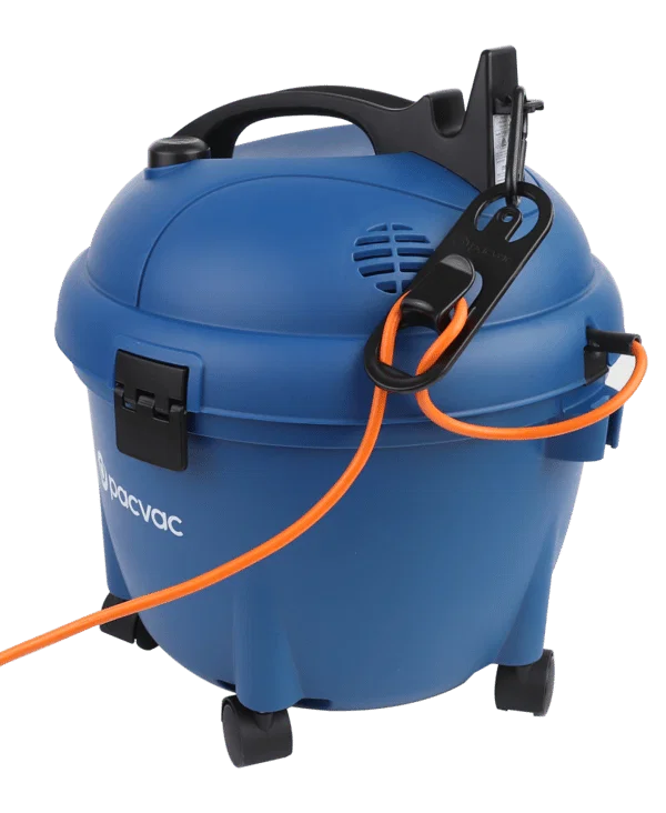 Cleaner using Pacvac Glide canister vacuum in commercial space