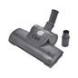 A dark gray vacuum cleaner floor head with an adjustable neck and a separate attachment nozzle, shown on a plain white background.