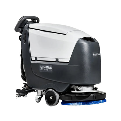 A Nilfisk SC3600 L10000i00 electric floor cleaner with a white and dark gray body, blue bristles, and black wheels, shown on a solid white background.
