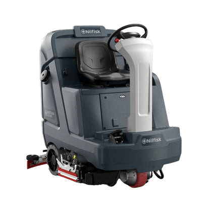 A Nilfisk industrial floor cleaner with a dark gray body, black seat, white control column, and red accents, shown on a plain white background.