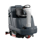 A Nilfisk industrial floor cleaner with a dark gray body, black seat, white control column, and red accents, shown on a plain white background.