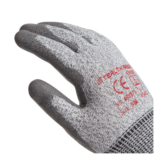 A single knit work glove shown on a white background, with a gray knit body and darker gray coated finger and palm areas. Red printed text and a CE mark are visible on the back of the hand.